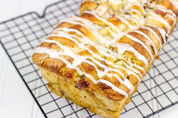 Stuffed with cinnamon, apples and pecans, this Maple Glazed Apple Pecan Bread is the perfect way to celebrate the arrival of apple season!