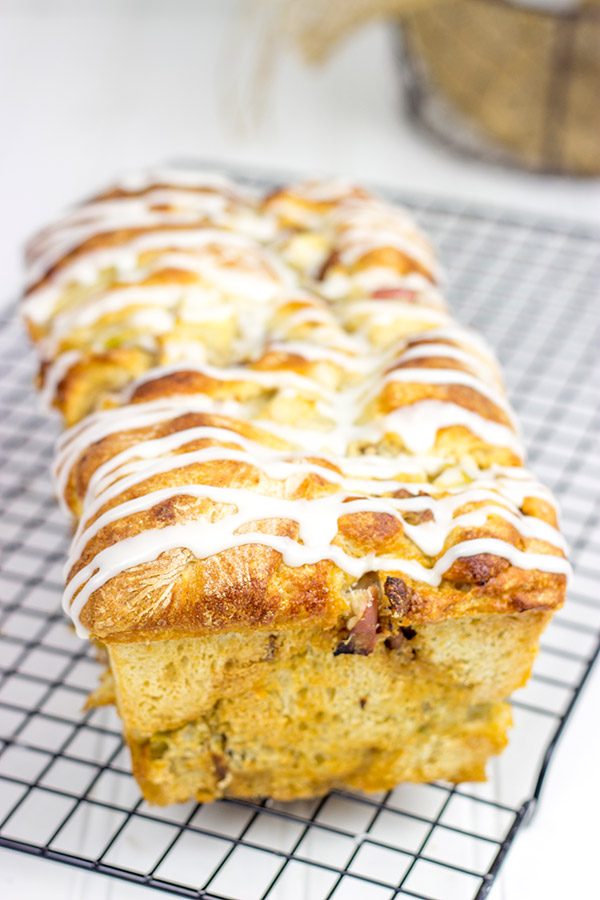 Stuffed with cinnamon, apples and pecans, this Maple Glazed Apple Pecan Bread is the perfect way to celebrate the arrival of apple season!