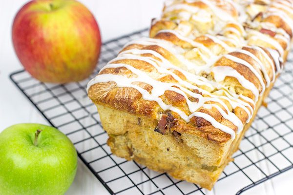 Stuffed with cinnamon, apples and pecans, this Maple Glazed Apple Pecan Bread is the perfect way to celebrate the arrival of apple season!