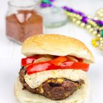 Loaded with Cajun flavor and topped with a remoulade sauce, these Spicy Cajun Burgers are sure to be a hit at your next backyard picnic!