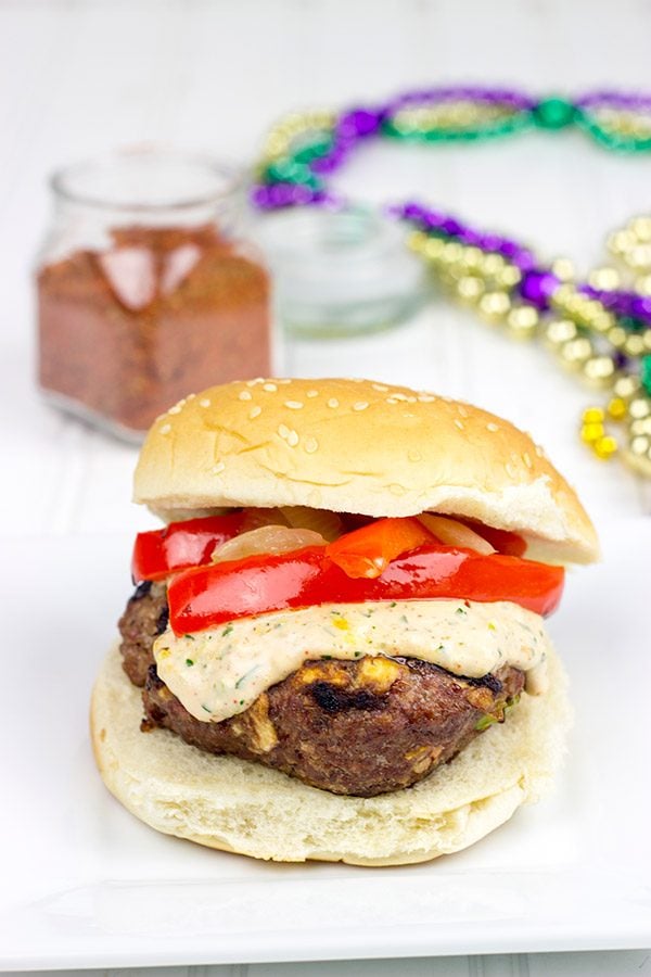 Loaded with Cajun flavor and topped with a remoulade sauce, these Spicy Cajun Burgers are sure to be a hit at your next backyard picnic!