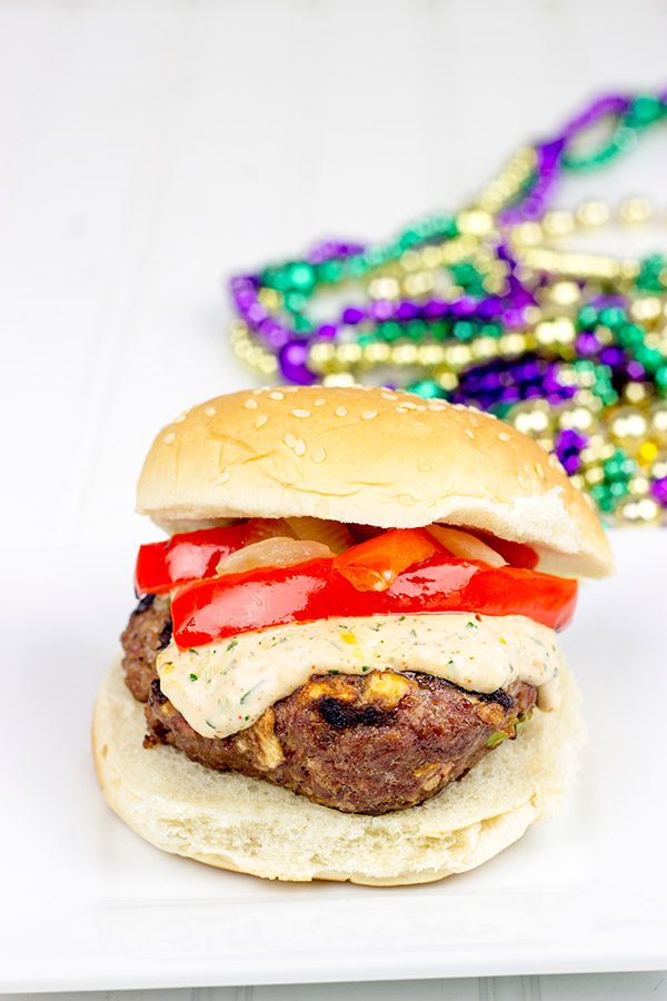 Loaded with Cajun flavor and topped with a remoulade sauce, these Spicy Cajun Burgers are sure to be a hit at your next backyard picnic!