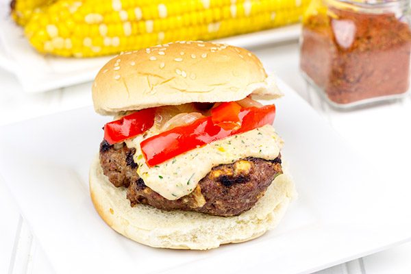 Loaded with Cajun flavor and topped with a remoulade sauce, these Spicy Cajun Burgers are sure to be a hit at your next backyard picnic!