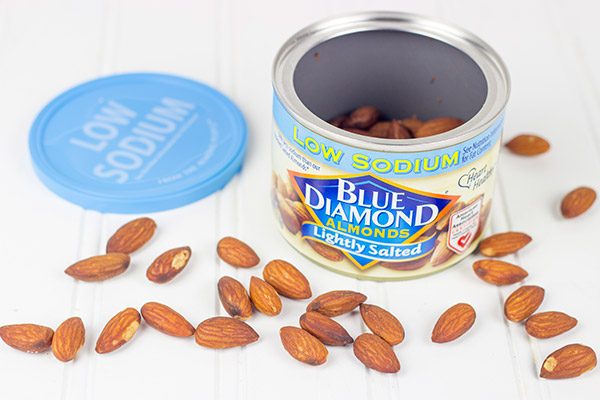 Rolled in chopped almonds and fresh herbs, this Almond Herb Goat Cheese makes for a quick and tasty summer snack!