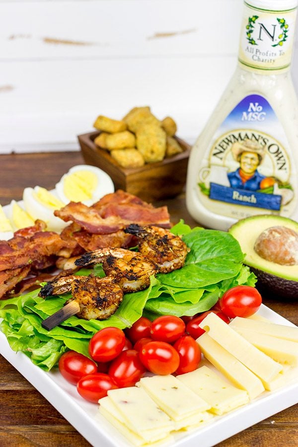 Topped with grilled Cajun shrimp, this Cajun Shrimp Chef Salad makes for one heck of a delicious summer meal!