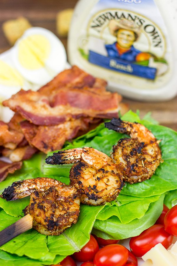 Topped with grilled Cajun shrimp, this Cajun Shrimp Chef Salad makes for one heck of a delicious summer meal!
