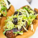 Grill up some brats and top 'em with this tasty Cherry Bacon Brussels Sprout Slaw!