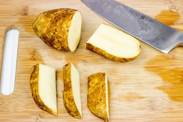 Serve these delicious Oven Roasted Potato Wedges with a quick and easy Smoky Ketchup. I dare you to just eat one!