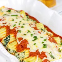 This Baked Manicotti with Spinach features a tasty ricotta filling...it's the perfect comfort food for a chilly late Fall night!