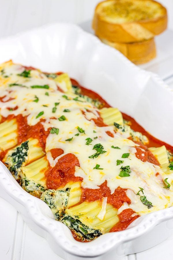 This Baked Manicotti with Spinach features a tasty ricotta filling...it's the perfect comfort food for a chilly late Fall night!