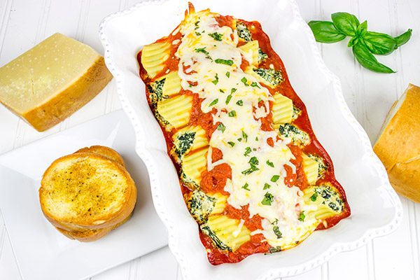 This Baked Manicotti with Spinach features a tasty ricotta filling...it's the perfect comfort food for a chilly late Fall night!