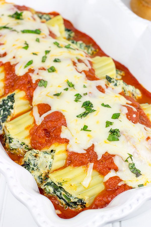 This Baked Manicotti with Spinach features a tasty ricotta filling...it's the perfect comfort food for a chilly late Fall night!
