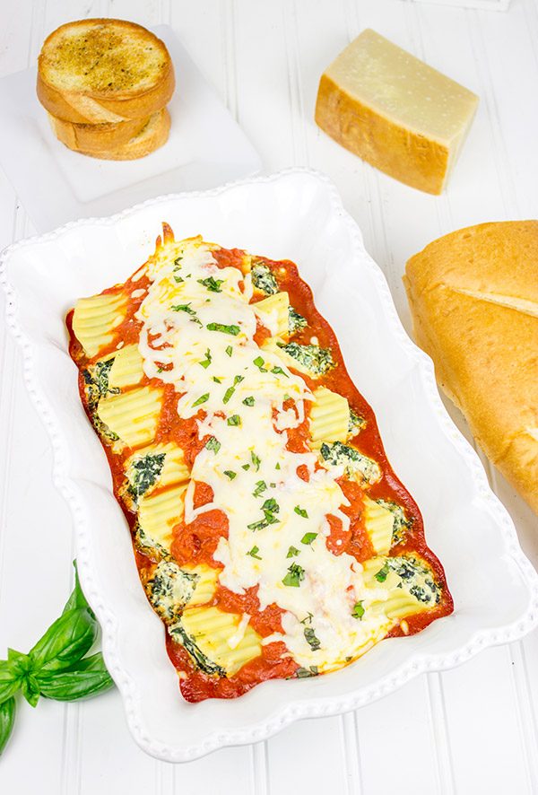 This Baked Manicotti with Spinach features a tasty ricotta filling...it's the perfect comfort food for a chilly late Fall night!