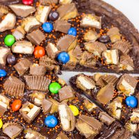 This Brownie Pizza is a fun way to use some of that extra Halloween candy this year!