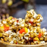 Grab some extra candy corn and whip up a batch of this tasty Halloween Caramel Corn!