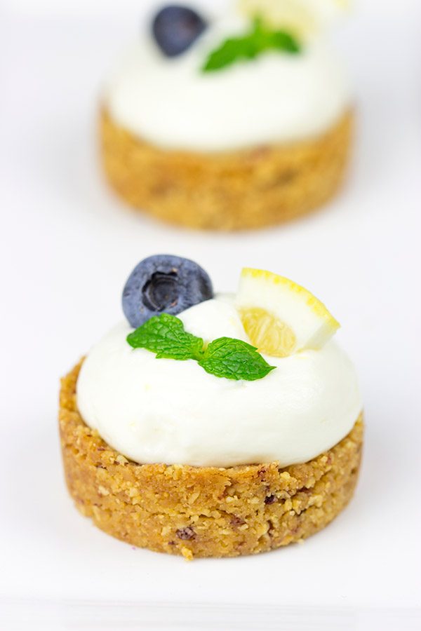 Featuring a blueberry almond crust topped with a light lemon cream, these Lemon Blueberry Almond Bites make for a great summer dessert!