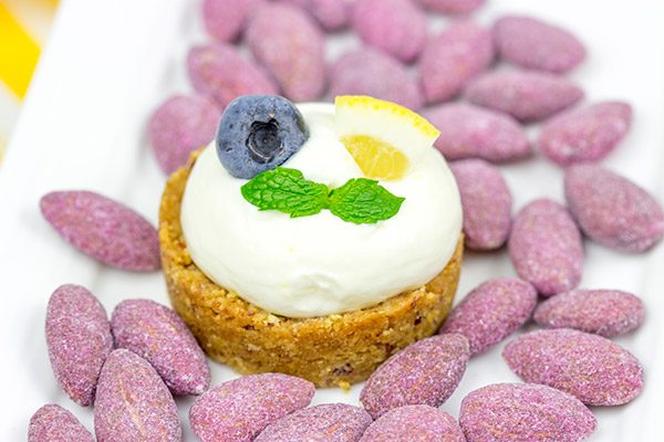 Featuring a blueberry almond crust topped with a light lemon cream, these Lemon Blueberry Almond Bites make for a great summer dessert!