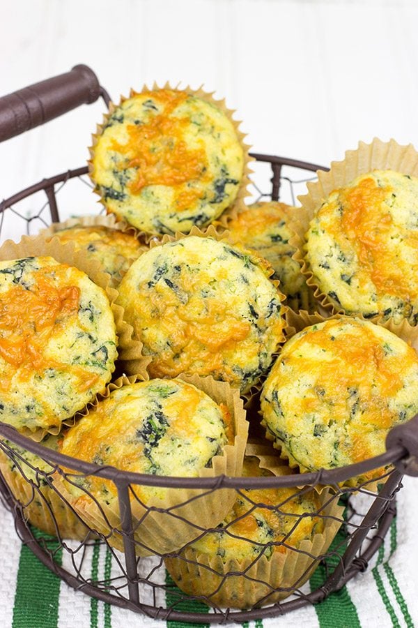 Stuffed with spinach and cheese, these Spinach Cheddar Cornbread Muffins are great alongside a hot bowl of chili or stew!