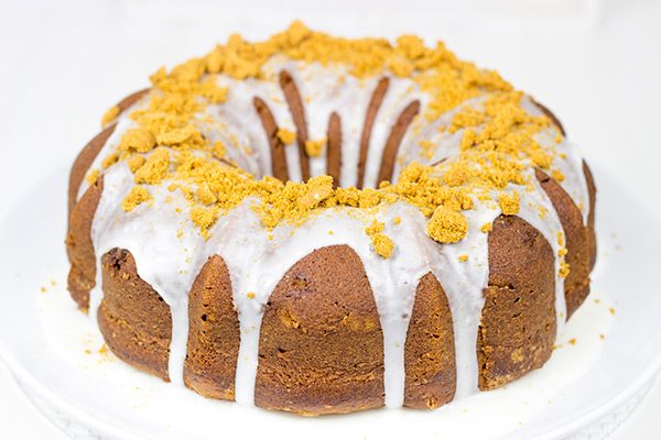 Grab a mug of coffee and a slice of this Cookie Butter Pound Cake for a delicious holiday treat!