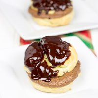 Filled with a rice chocolate pudding and topped with a decadent chocolate glaze, these Double Chocolate Cream Puffs will satisfy any chocoholic in your family!