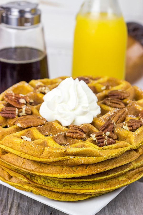 These Pecan Pumpkin Waffles are packed with tasty autumn spices...and they're perfect for Sunday morning breakfast!