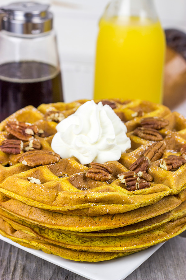 These Pecan Pumpkin Waffles are packed with tasty autumn spices...and they're perfect for Sunday morning breakfast!