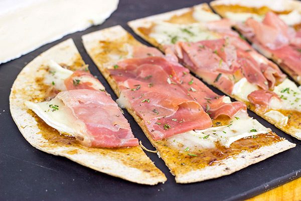 Step up your snack time with these easy Brie and Fig Jam Flatbreads!