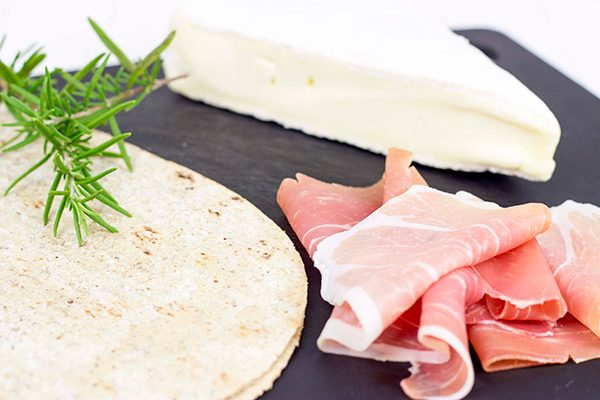 Step up your snack time with these easy Brie and Fig Jam Flatbreads!