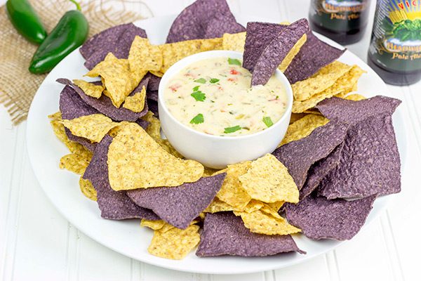 This Classic Nacho Cheese Dip is a favorite come kickoff (or tipoff) in our house!