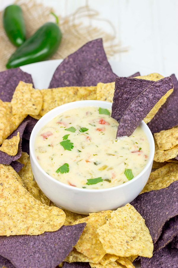 This Classic Nacho Cheese Dip is a favorite come kickoff (or tipoff) in our house!
