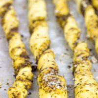 These Garlic Pesto Breadsticks are a fun and tasty snack...perfect for football games on cold winter weekends!
