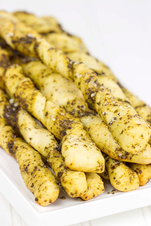These Garlic Pesto Breadsticks are a fun and tasty snack...perfect for football games on cold winter weekends!