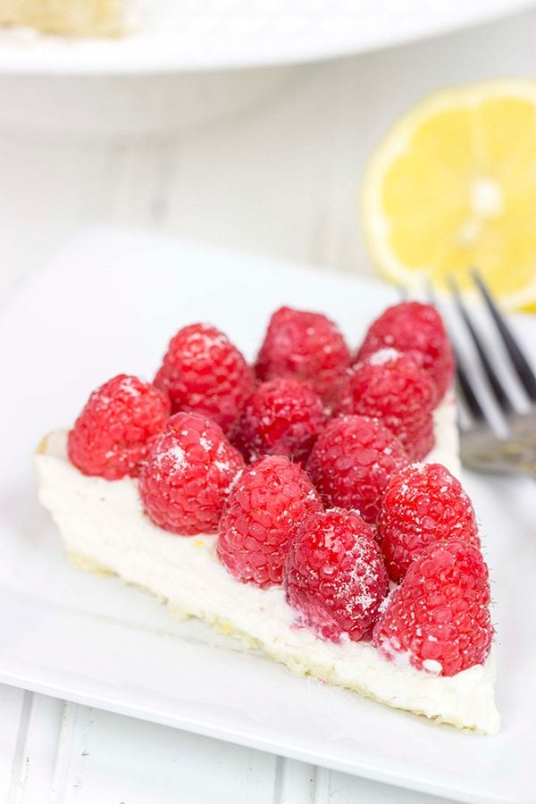 Featuring a light, lemony base and topped with fresh raspberries, this Lemon Raspberry Mascarpone Tart is bound to be a new holiday favorite in your house!