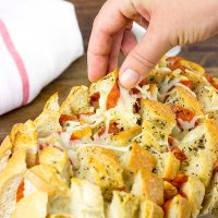 This Pepperoni Pizza Pull Apart Bread is darn good eats... especially when sports are on tv!