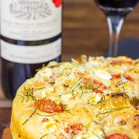Celebrate the holidays with a batch of this tasty Goat Cheese and Tomato Focaccia!