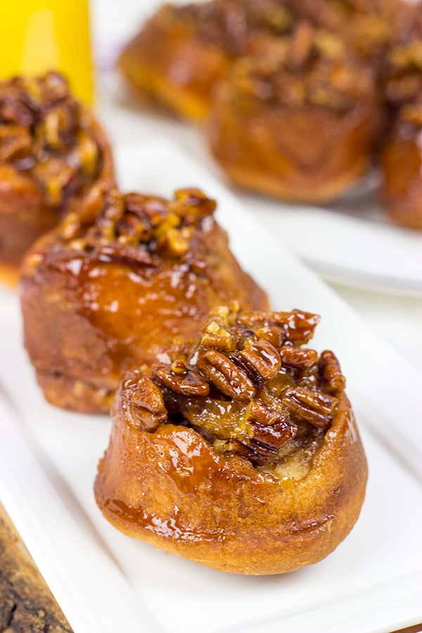 Topped with a delicious gooey honey pecan mixture, these Honey Pecan Sticky Buns will magically disappear from your kitchen!