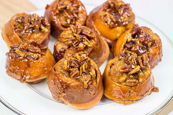 Topped with a delicious gooey honey pecan mixture, these Honey Pecan Sticky Buns will magically disappear from your kitchen!