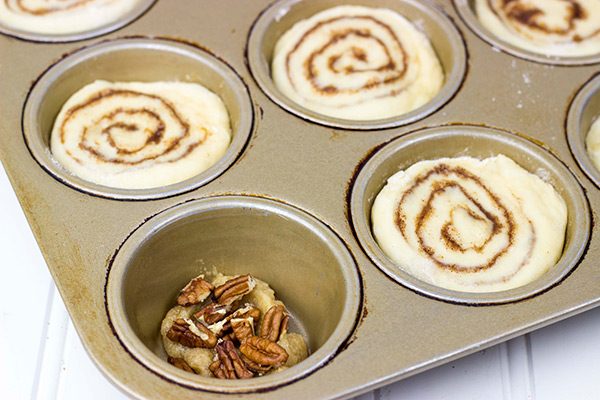Topped with a delicious gooey honey pecan mixture, these Honey Pecan Sticky Buns will magically disappear from your kitchen!