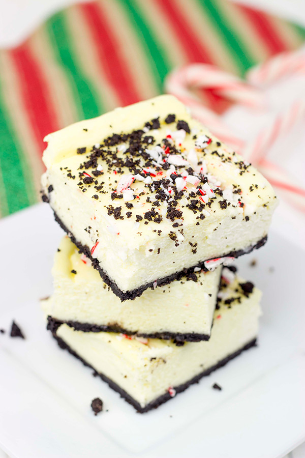 Packed with holiday spirit, peppermint and chocolate, these Peppermint Mocha Cheesecake Bars are sure to be a hit in your house!