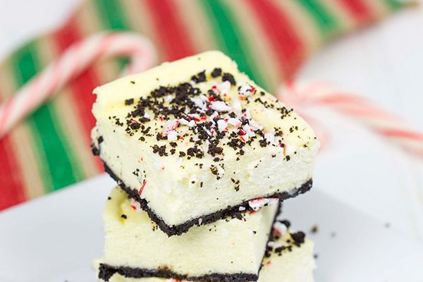 Packed with holiday spirit, peppermint and chocolate, these Peppermint Mocha Cheesecake Bars are sure to be a hit in your house!