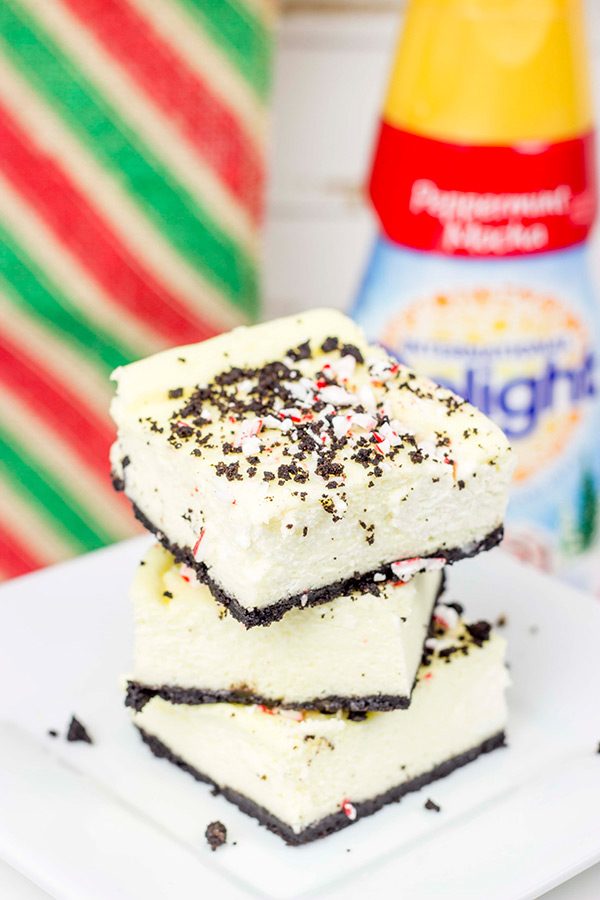 Packed with holiday spirit, peppermint and chocolate, these Peppermint Mocha Cheesecake Bars are sure to be a hit in your house!