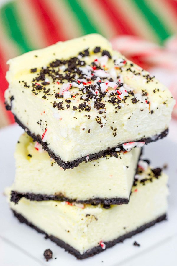 Packed with holiday spirit, peppermint and chocolate, these Peppermint Mocha Cheesecake Bars are sure to be a hit in your house!