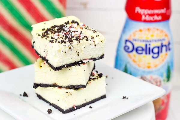 Packed with holiday spirit, peppermint and chocolate, these Peppermint Mocha Cheesecake Bars are sure to be a hit in your house!