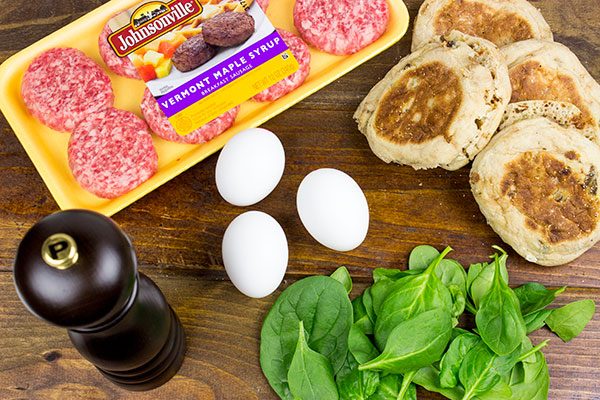Making breakfast for a crowd?  Kitchen hack: Bake eggs in muffin tins to save time!  These Sausage and Egg Muffin Sandwiches are a favorite around our house!
