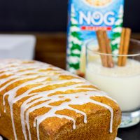 Celebrate the holidays with a slice of Eggnog Pound Cake and a mug of hot chocolate!