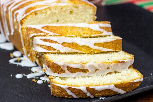 Celebrate the holidays with a slice of Eggnog Pound Cake and a mug of hot chocolate!
