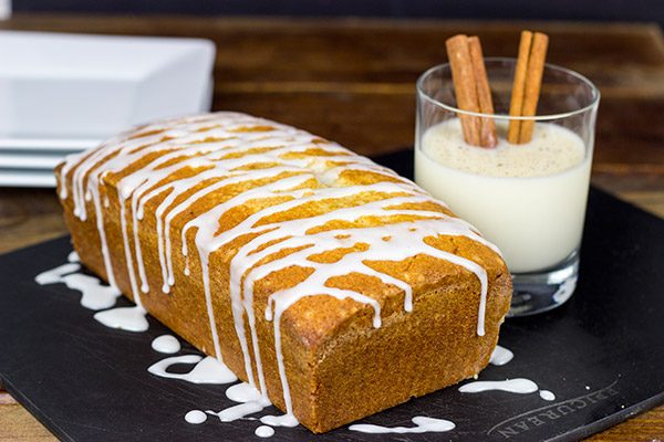 Celebrate the holidays with a slice of Eggnog Pound Cake and a mug of hot chocolate!