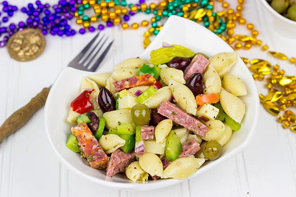Grab some beads and celebrate Mardi Gras with this tasty Muffaletta Pasta Salad!