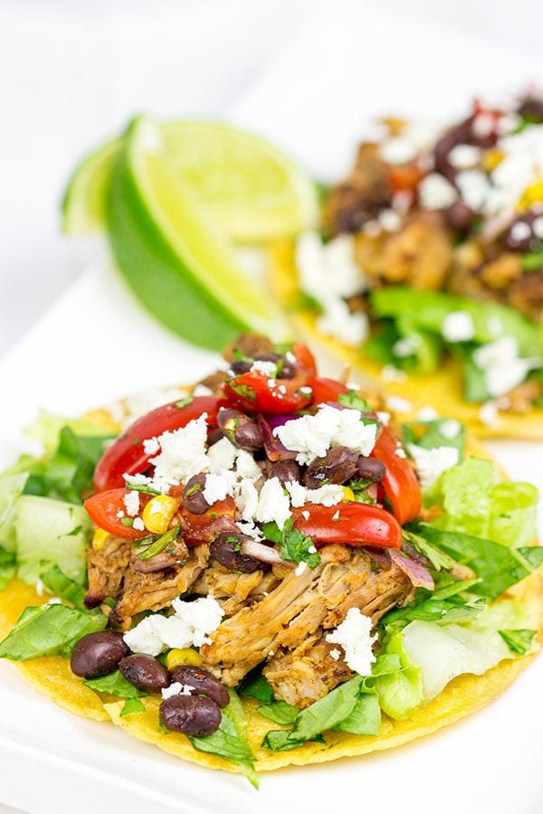 These Pulled Pork Tostadas are a quick and easy way to break out of the boring dinner routine!