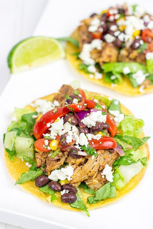 These Pulled Pork Tostadas are a quick and easy way to break out of the boring dinner routine!